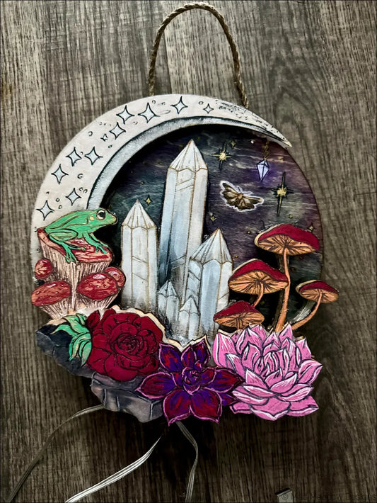 Whimsical crescent moon usb light with intricately hand-painted crystals mushrooms and flowers in vibrant colors