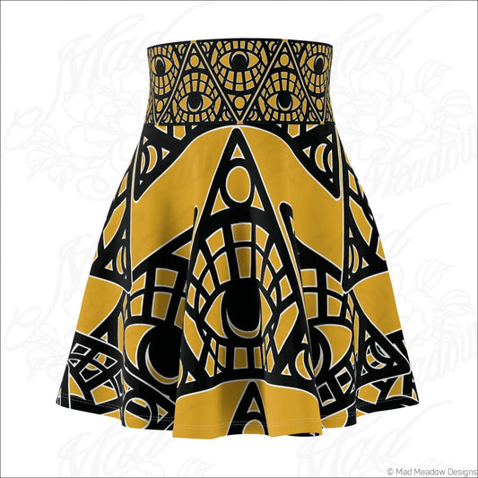 A vibrant mystic eye tribal skater skirt in mustard with an intricate printed care label design