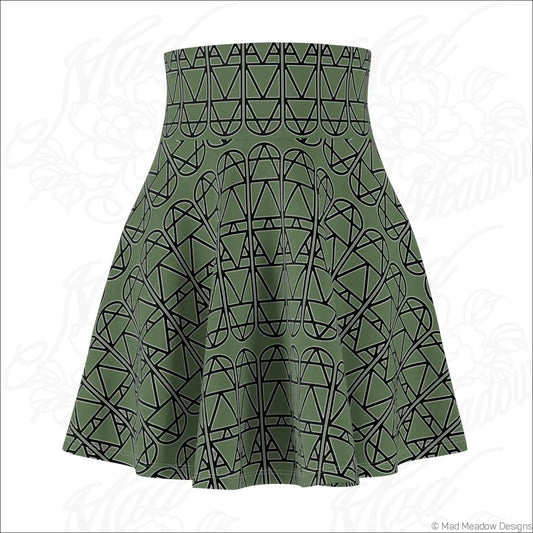 Olive green high waisted skater skirt with bold black geometric pattern and care instructions for hand wash