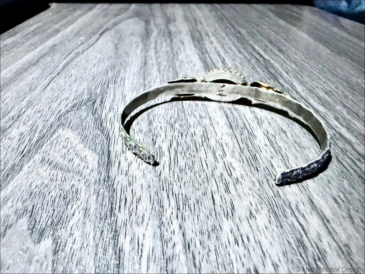 Sterling Silver Cuff Bracelet with Brass Skulls and Lava Stone - Bracelet