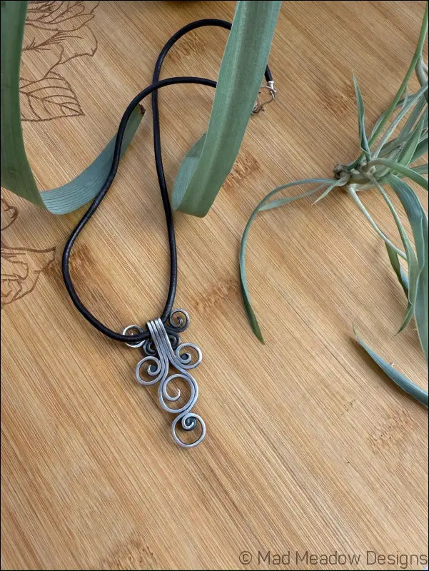 Fiddlehead Sterling Silver and Peridot Artisan Made Pendant on Leather - Jewelry
