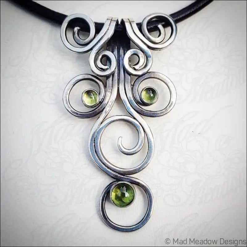 Fiddlehead Sterling Silver and Peridot Artisan Made Pendant on Leather - Jewelry