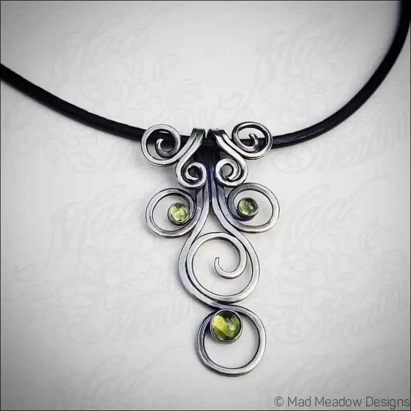 Fiddlehead Sterling Silver and Peridot Artisan Made Pendant on Leather - Jewelry