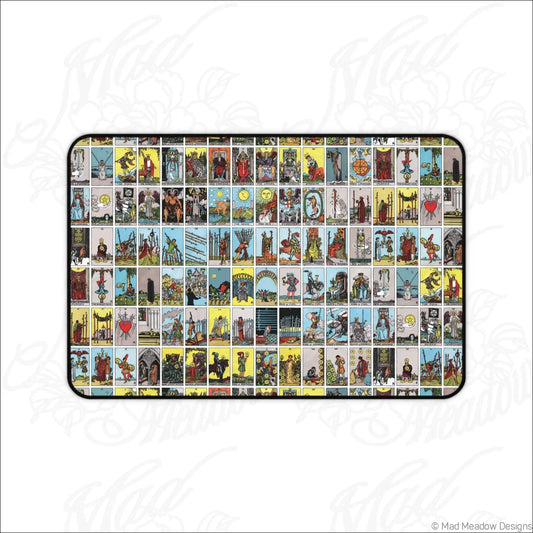 Rectangular desk mat with a colorful vintage lotería-style tarot card grid design perfect for your desk setup with care instructions to clean with warm water