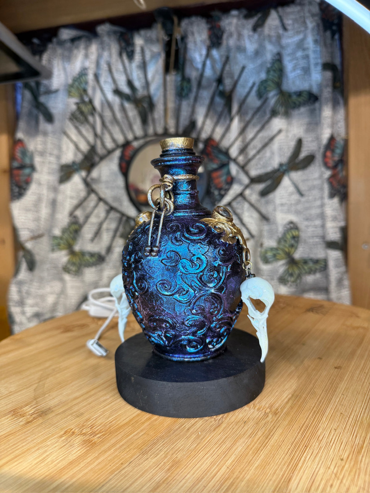 Potion Bottle Table Light w/ Bird Skulls