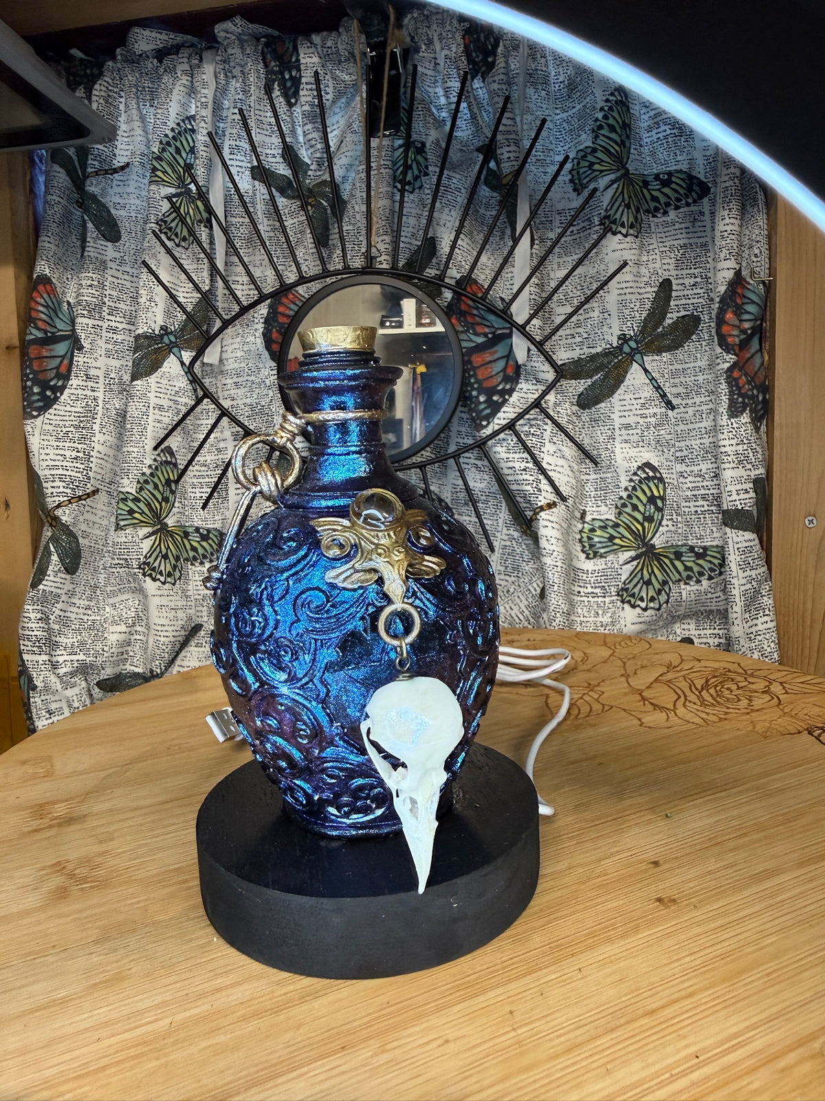 Potion Bottle Table Light w/ Bird Skulls