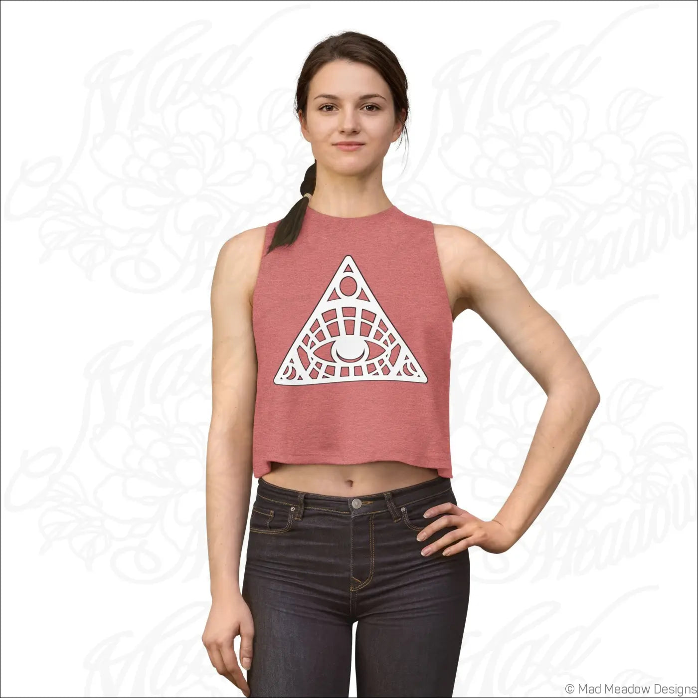 A dusty rose sleeveless crop top with a white all-seeing eye triangle design made from combed ring-spun cotton