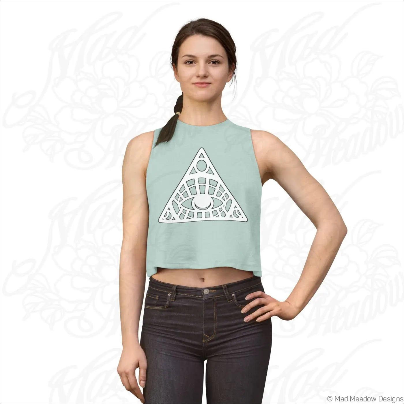 Light green sleeveless crop top with white all-seeing eye design made of soft combed ring-spun cotton
