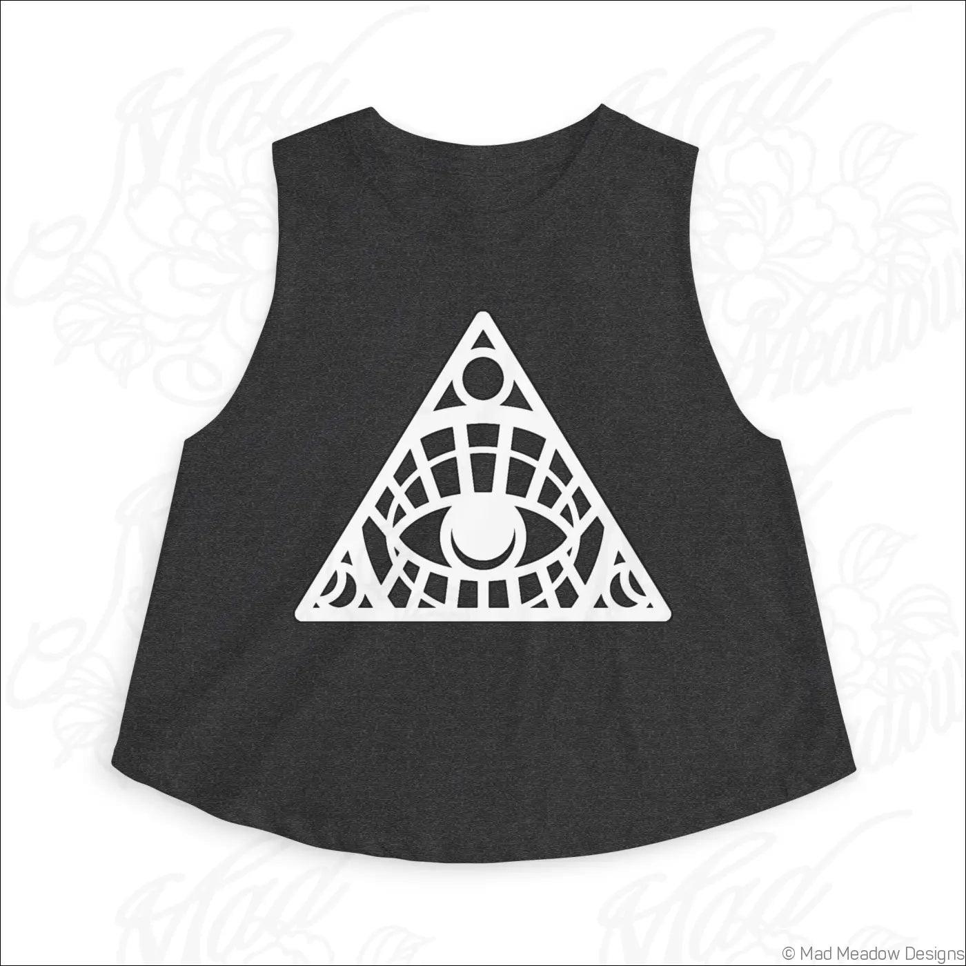 Black sleeveless crop top with bold white geometric eye design in intricate triangle pattern made of combed ring-spun cotton