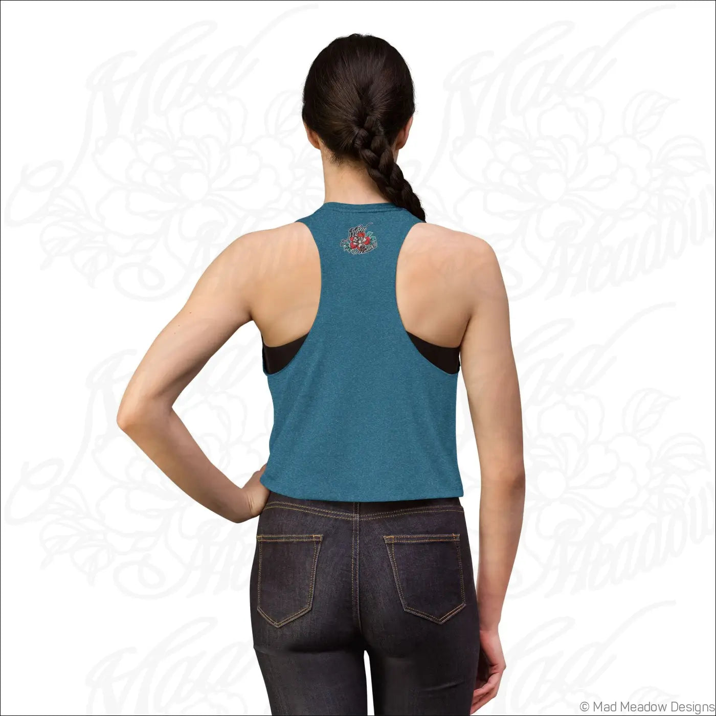 Teal racerback crop top with black mesh sides and floral embroidery made from soft combed ring-spun cotton
