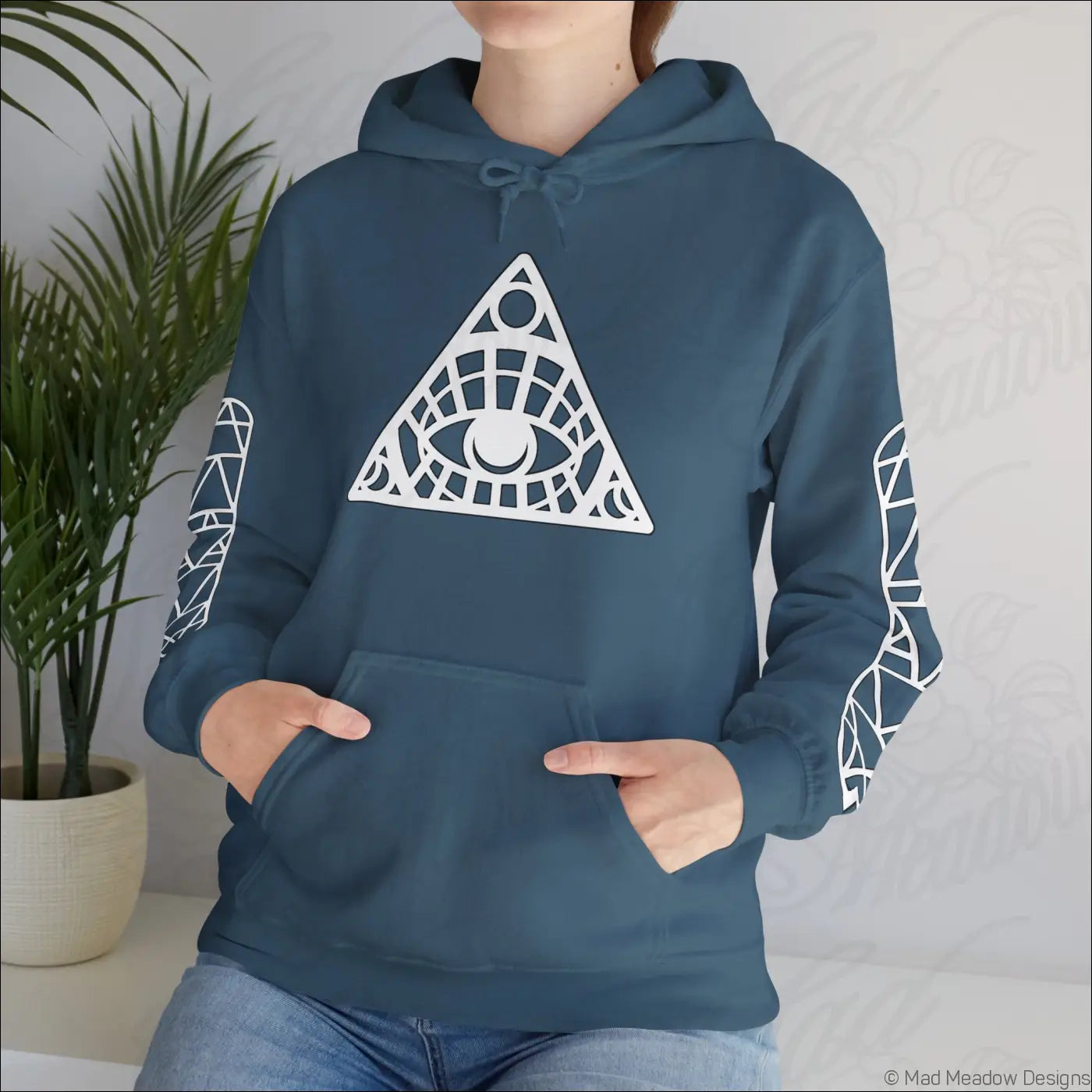 Navy blue all-seeing eye triangle hoodie with white geometric design and kangaroo pouch care instructions tumble dry safe