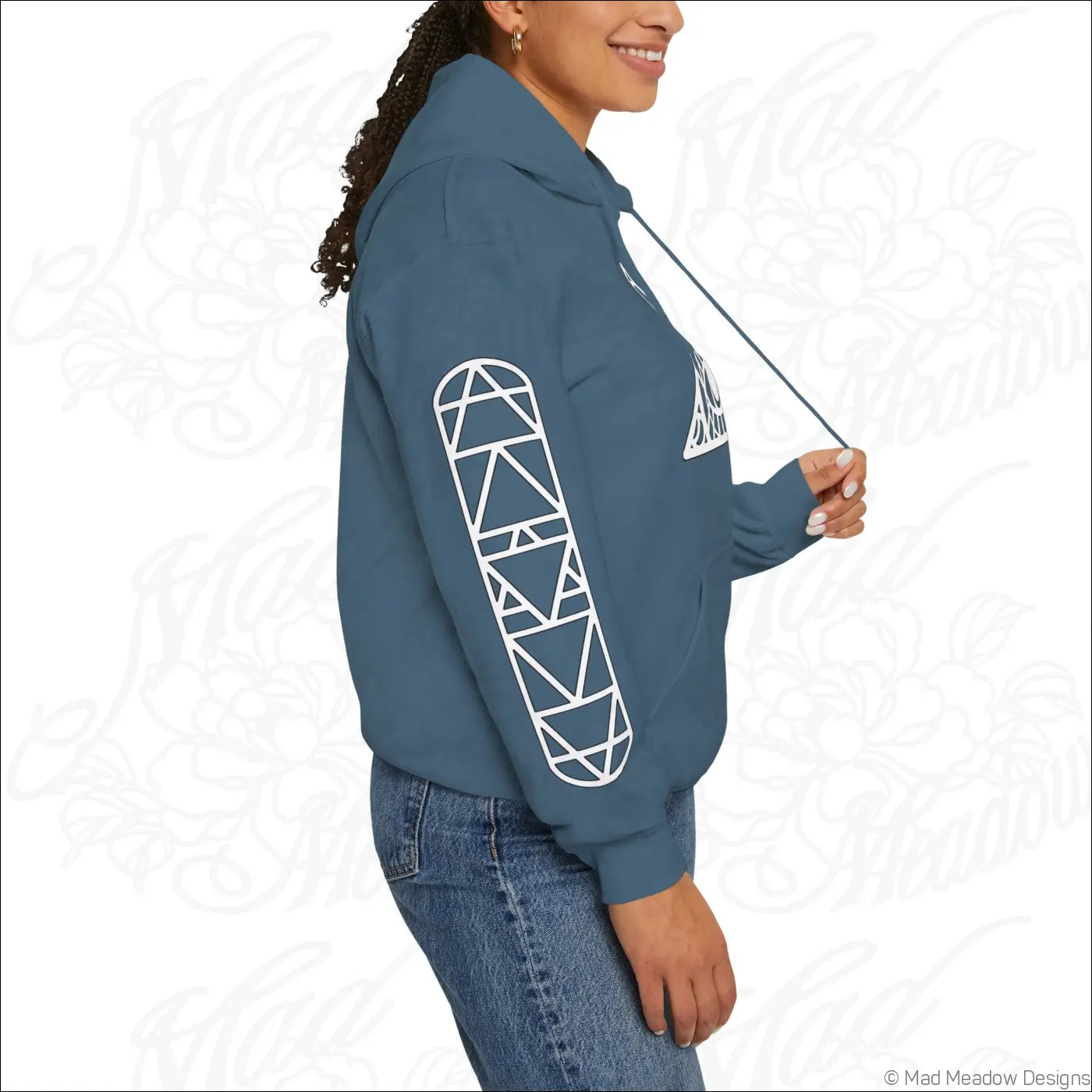 Teal all-seeing eye triangle hoodie with white geometric skateboard graphic on sleeve and chest features a kangaroo pouch and care instructions for tumble dry