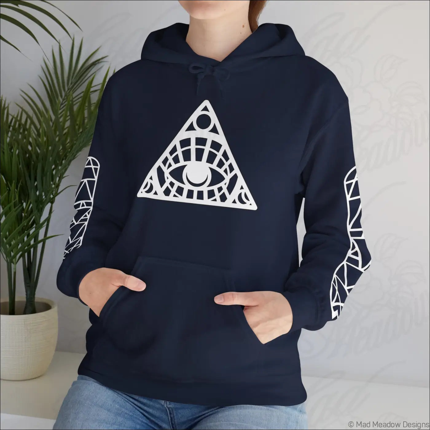 Navy blue all-seeing eye triangle hoodie with geometric sleeves and kangaroo pouch care instructions say tumble dry low