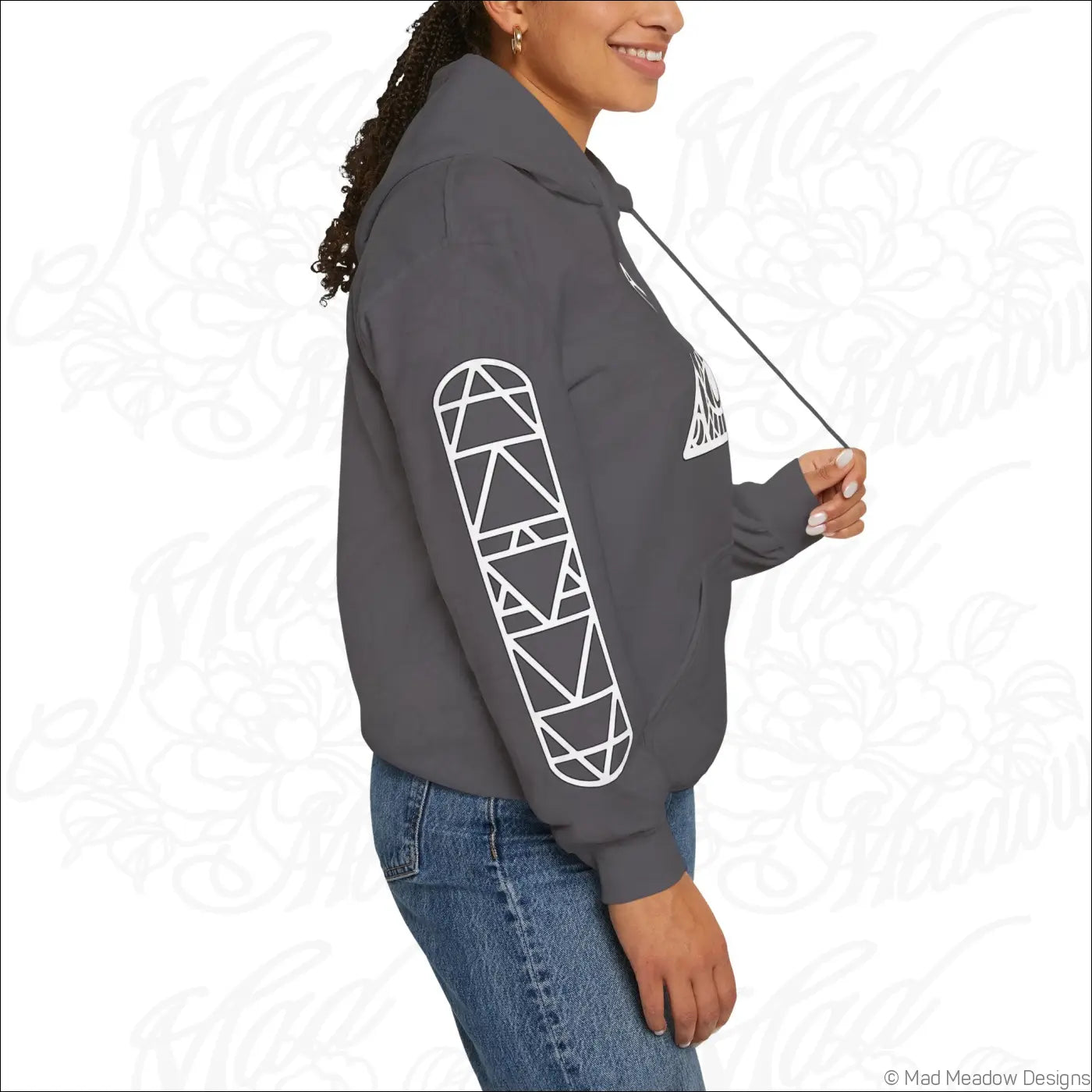 Gray all-seeing eye triangle hoodie with white geometric skateboard graphic on sleeve and kangaroo pouch, tumble dry care instructions