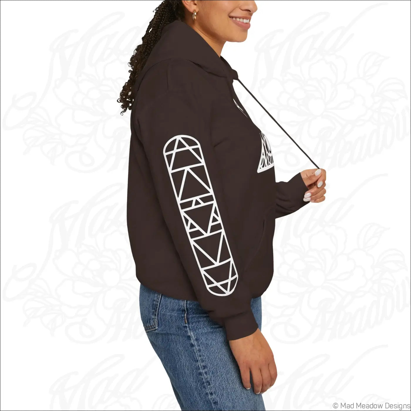Black hoodie with white geometric skateboard graphic on the sleeve featuring kangaroo pouch and easy care instructions to tumble dry
