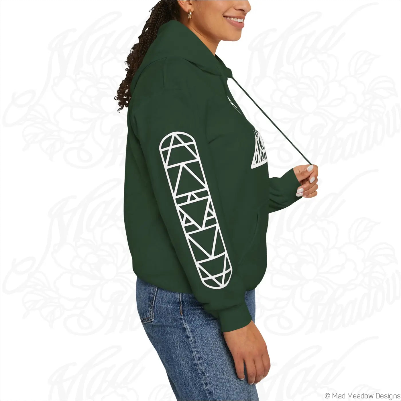 Dark green all-seeing eye triangle hoodie with white geometric skateboard graphic on sleeve and kangaroo pouch, care instructions suggest tumble dry low