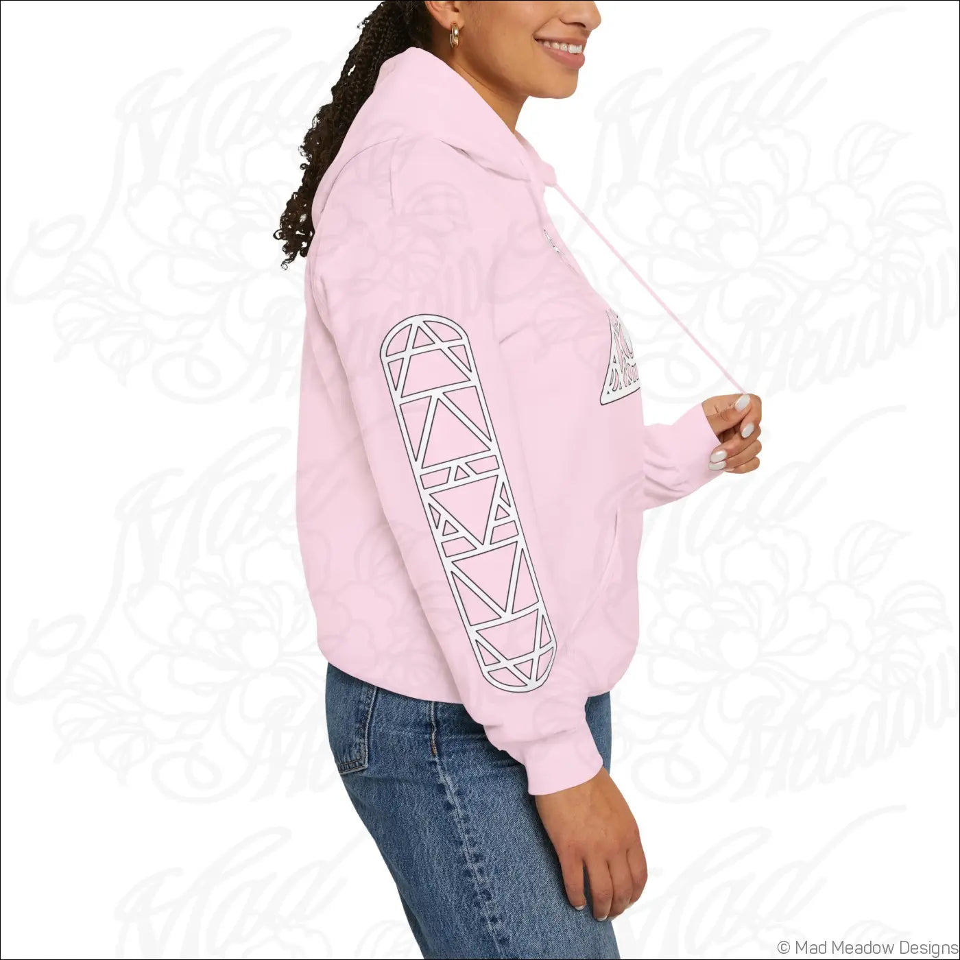 Pink all-seeing eye triangle hoodie with white geometric skateboard graphic and kangaroo pouch care instructions tumble dry