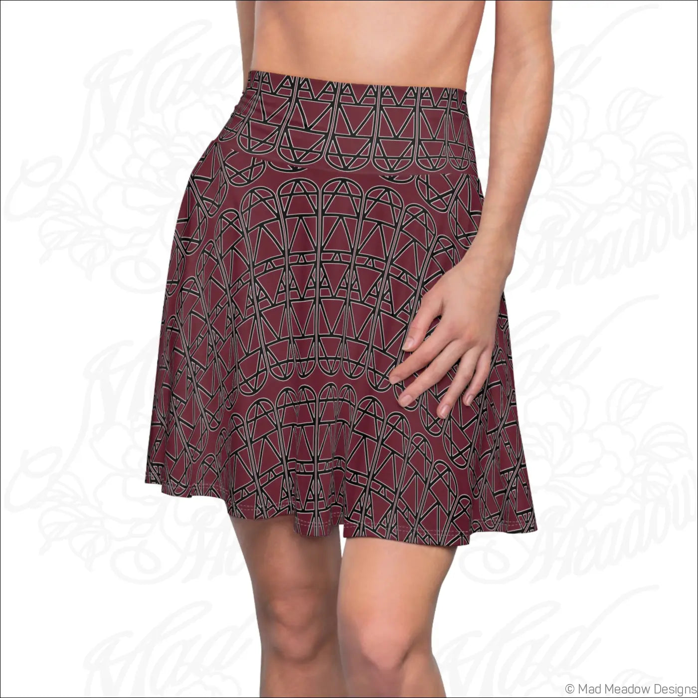A deep maroon skater skirt with black geometric column pattern in soft fabric perfect for hand wash care instructions