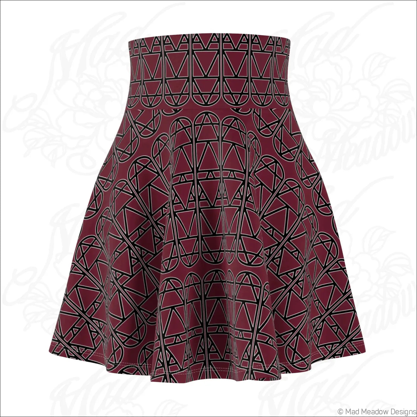 A maroon high waisted skater skirt with bold black geometric column repeat pattern and care instructions line dry