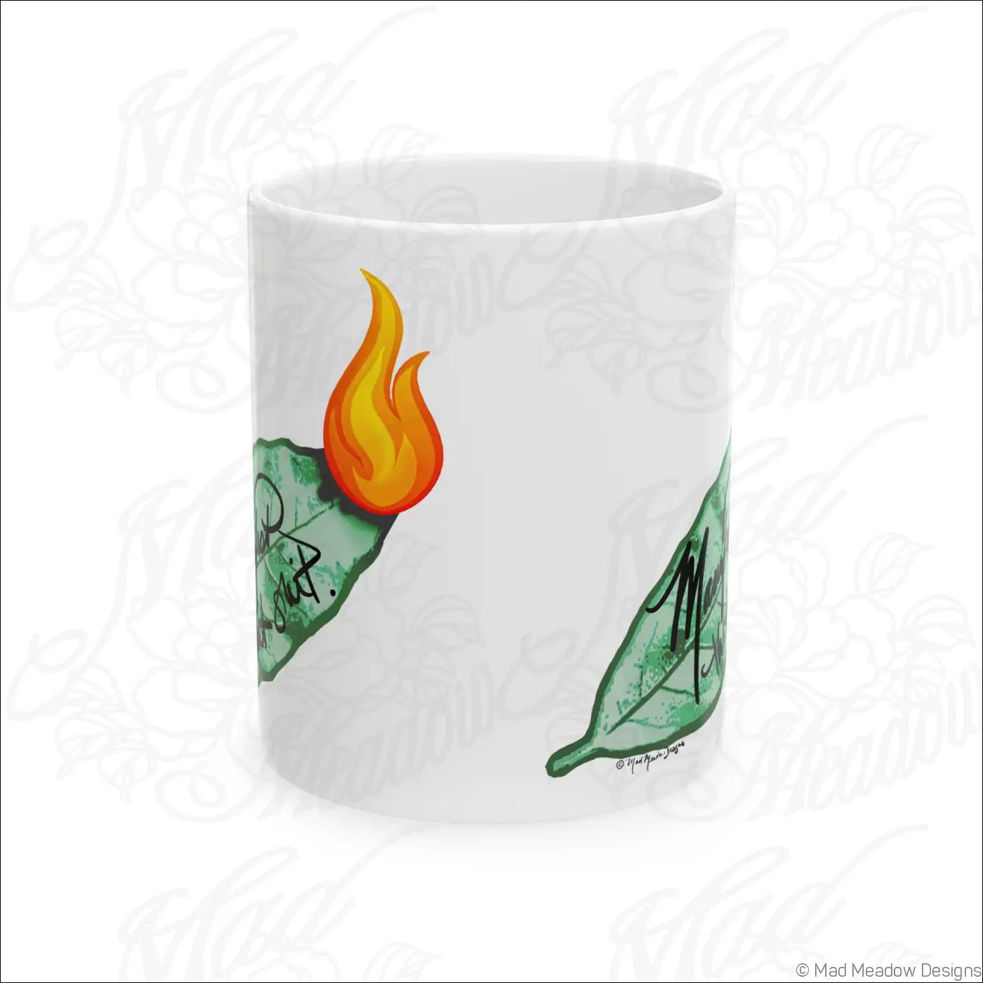 Glossy white ceramic mug with vibrant hand-drawn orange flame and green leaf art and comfortable c-handle