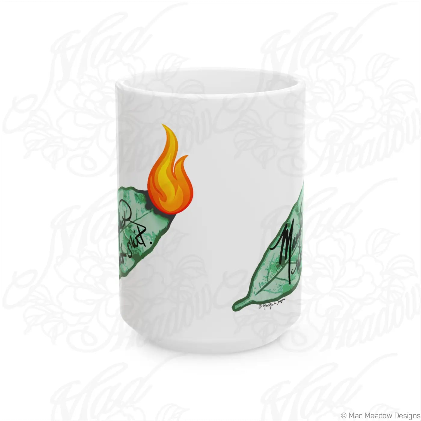 White ceramic mug with glossy white finish and comfortable c-handle featuring hand-drawn flaming leaf art and black text
