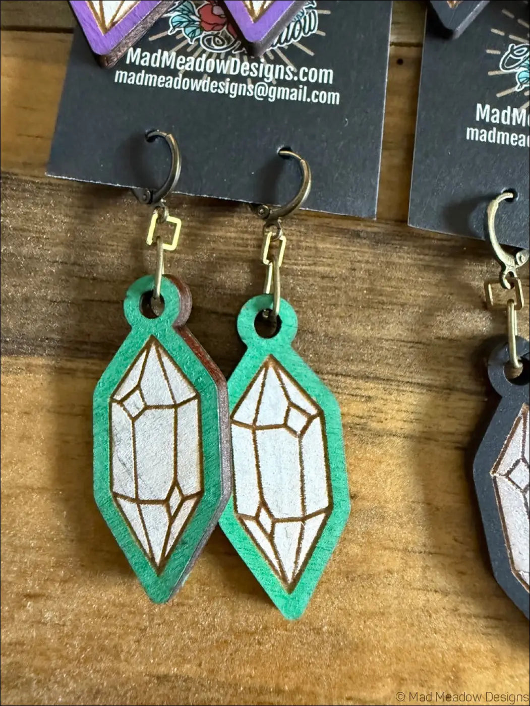 Emerald green and white crystal hand-painted wooden earrings with gold-toned hooks for stylish everyday wear