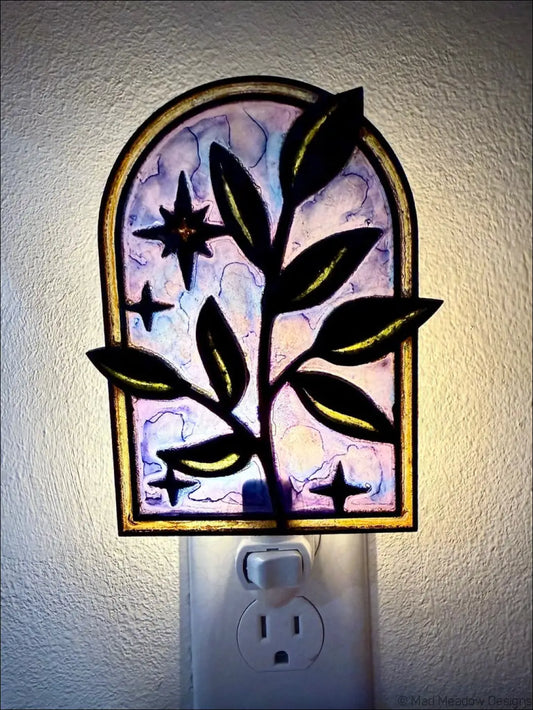 Elegant branch and twinkling stars night light with stained glass arched design in soft purple and blue colors