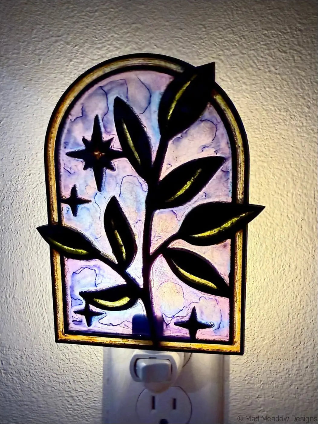 Elegant branch stained glass night light with twinkling stars and plant motif in purple and blue gradient background