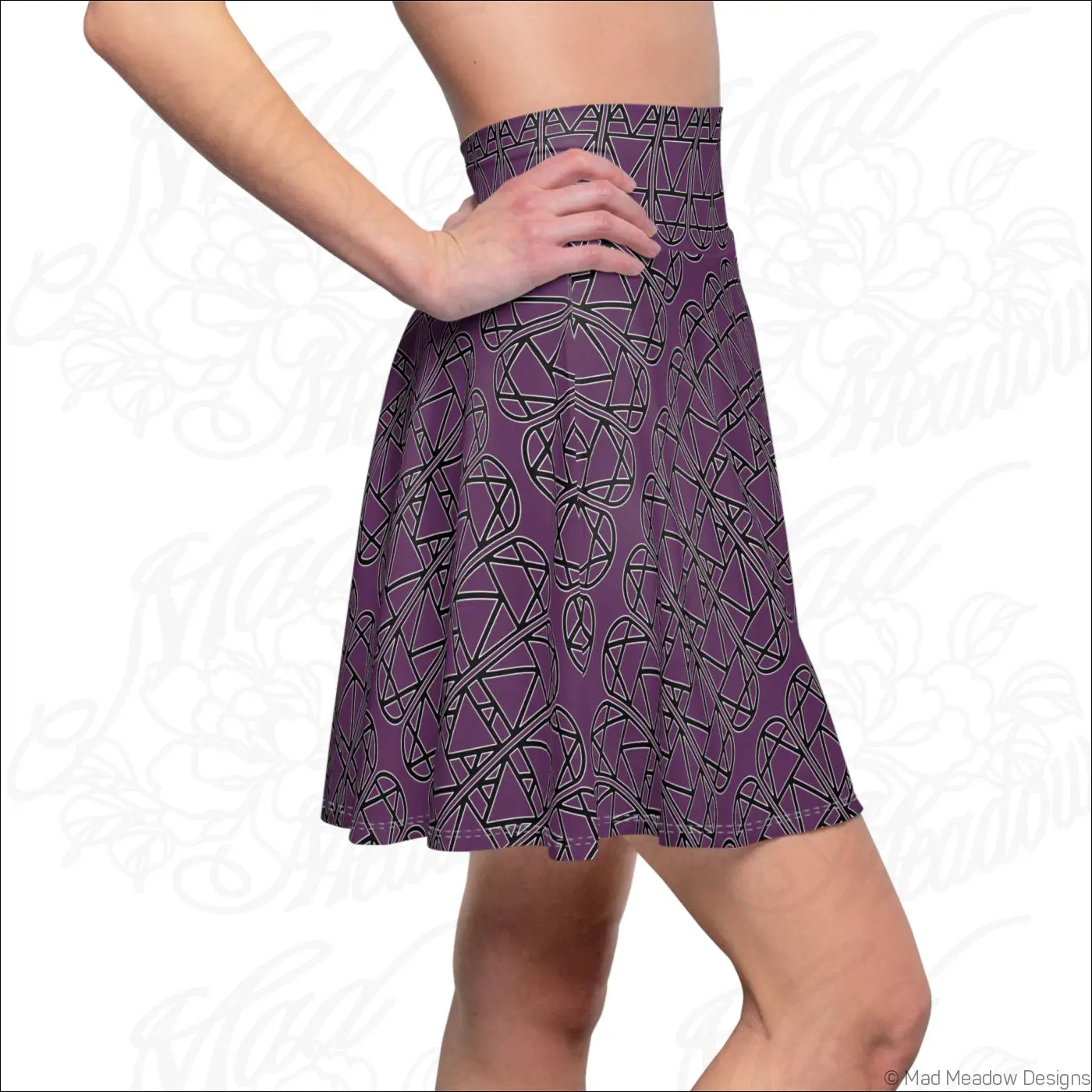 Purple high waisted flared skater skirt with black geometric pattern and care instructions hand wash recommended