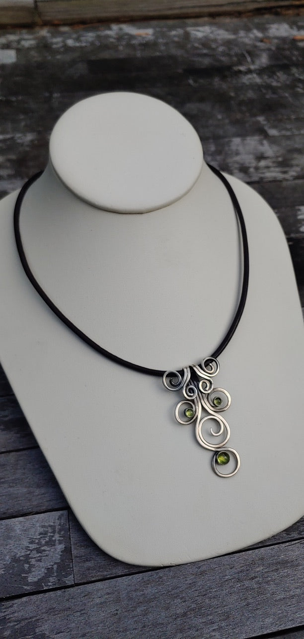 Fiddlehead Sterling Silver and Peridot Artisan Made Pendant on Leather - Jewelry