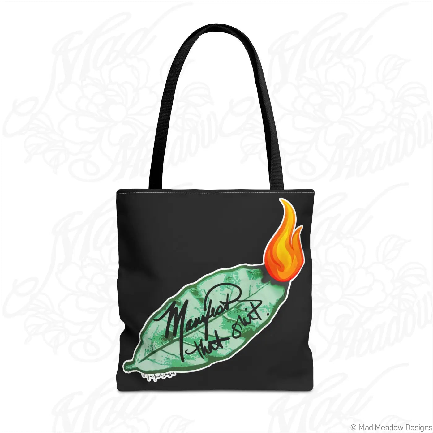 Black flaming bay leaf tote bag with green leaf orange flame and manifest that shit text in black cursive with boxed corners non-woven laminate