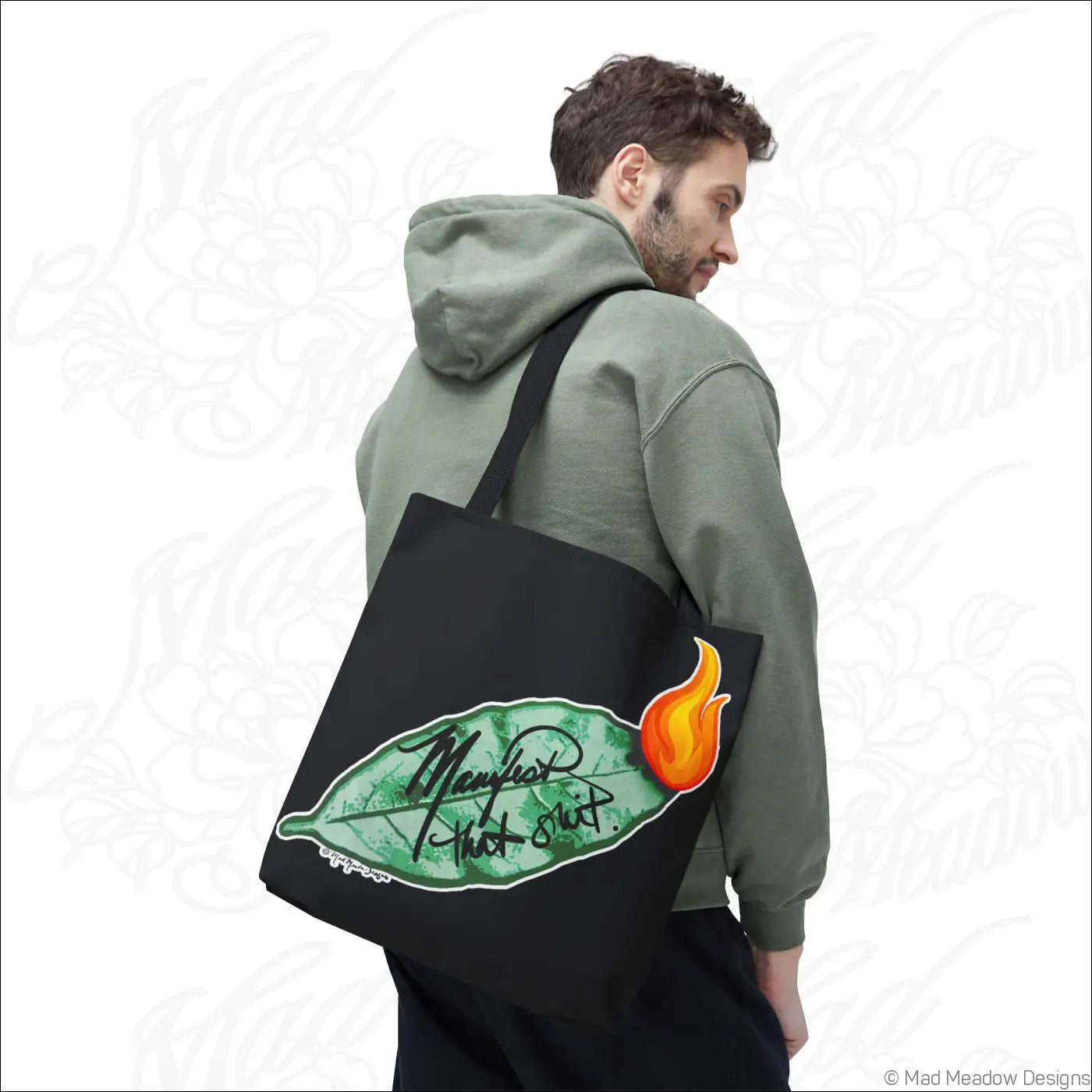 Black canvas flaming bay leaf tote bag with boxed corners non-woven laminate featuring green leaf and orange flame design
