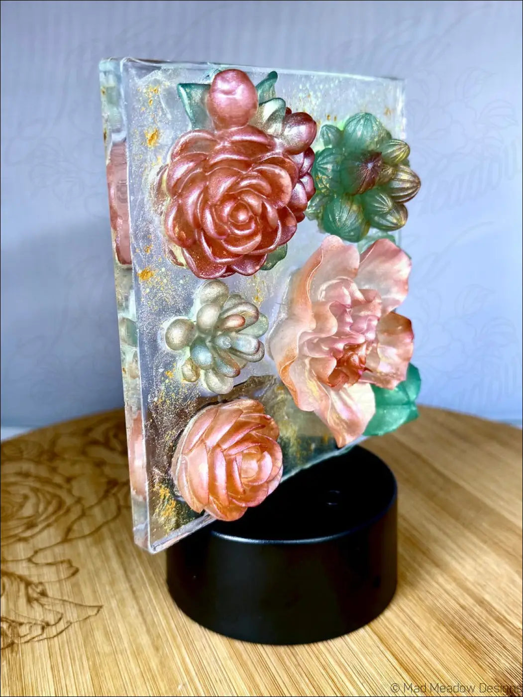 A translucent resin pastel garden nightlight with intricate pink and green flowers and dreamy hues rgb color change