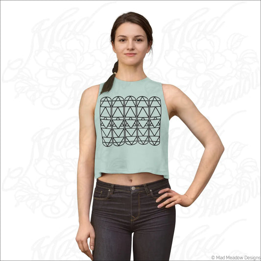 Light green sleeveless crop top with black geometric triangle pattern made from soft combed ring spun cotton