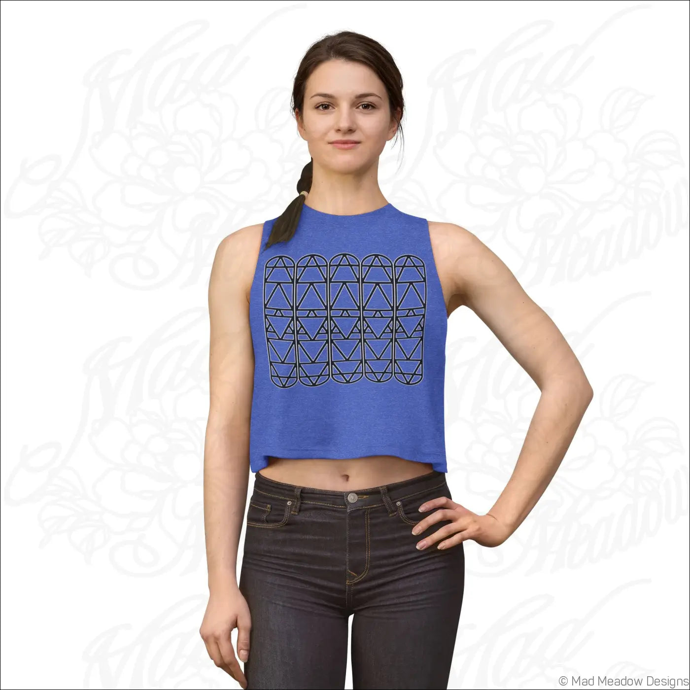 Blue sleeveless crop top with black geometric triangle pattern on chest made of comfy combed ring spun cotton