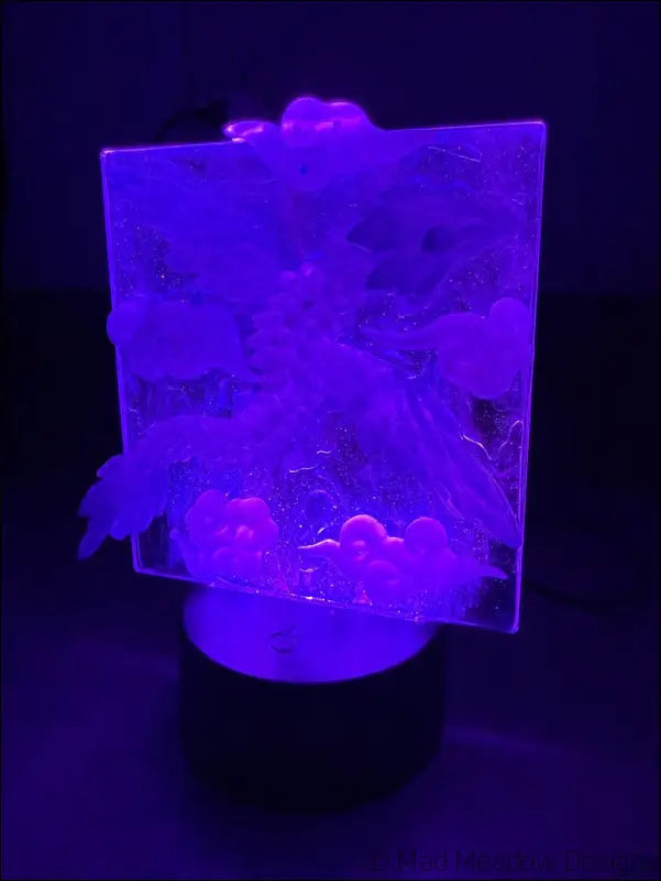Glowing Resin Phoenix Sculpture with Night Sky and Purple Dragon Lighting - Light