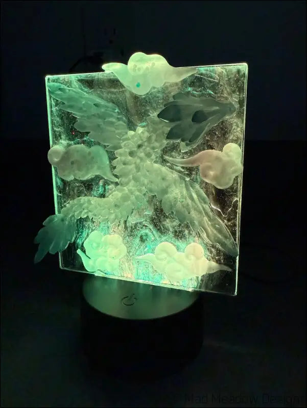 Glowing Resin Phoenix Sculpture with Night Sky and Purple Dragon Lighting - Light