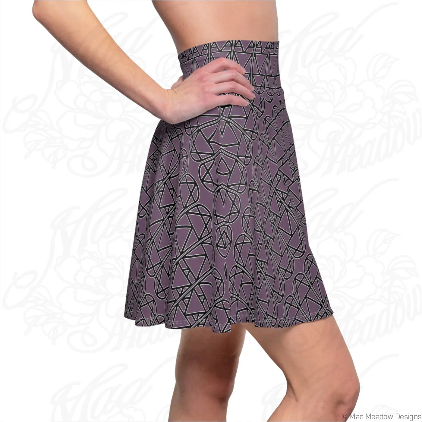 A muted purple high waisted skater skirt with black geometric pattern care instructions suggest hand wash only