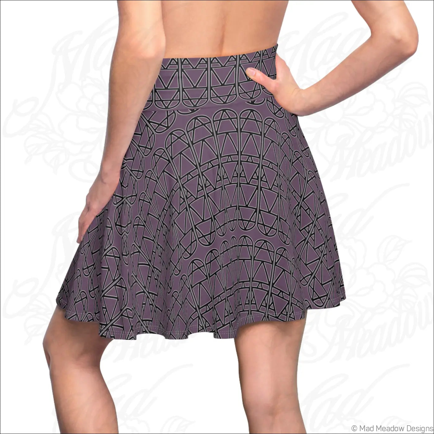 A muted purple skater skirt with a black geometric column pattern perfect for casual wear hand wash recommended