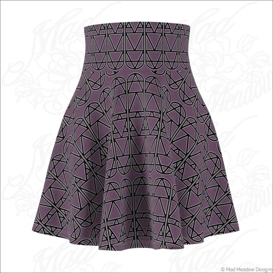 A deep purple high waisted skater skirt with black geometric elemental column pattern and hand wash care instructions
