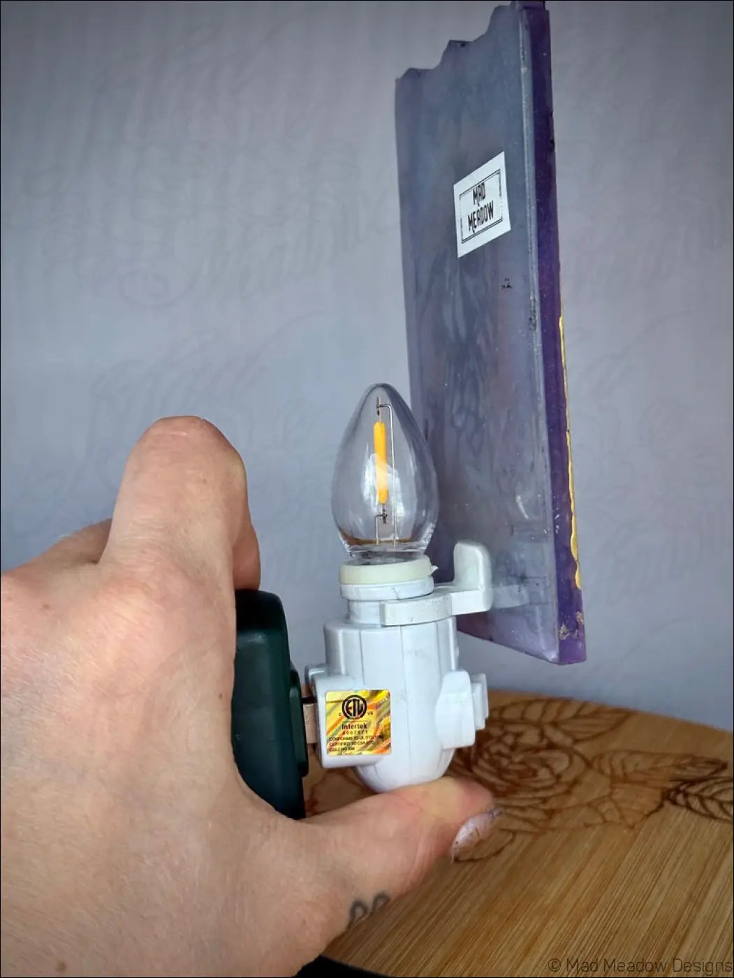 White plastic wall night light with clear glass bulb iridescent death tarot design pastel purple base sticker