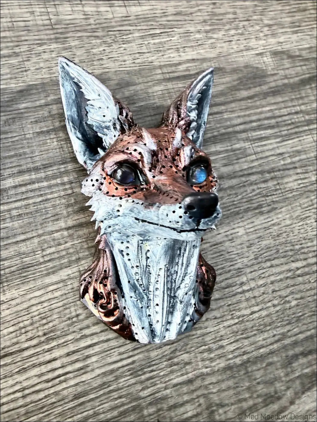 Detailed hand-painted red fox wall sculpture with natural labradorite blue eyes and metallic silver copper accents