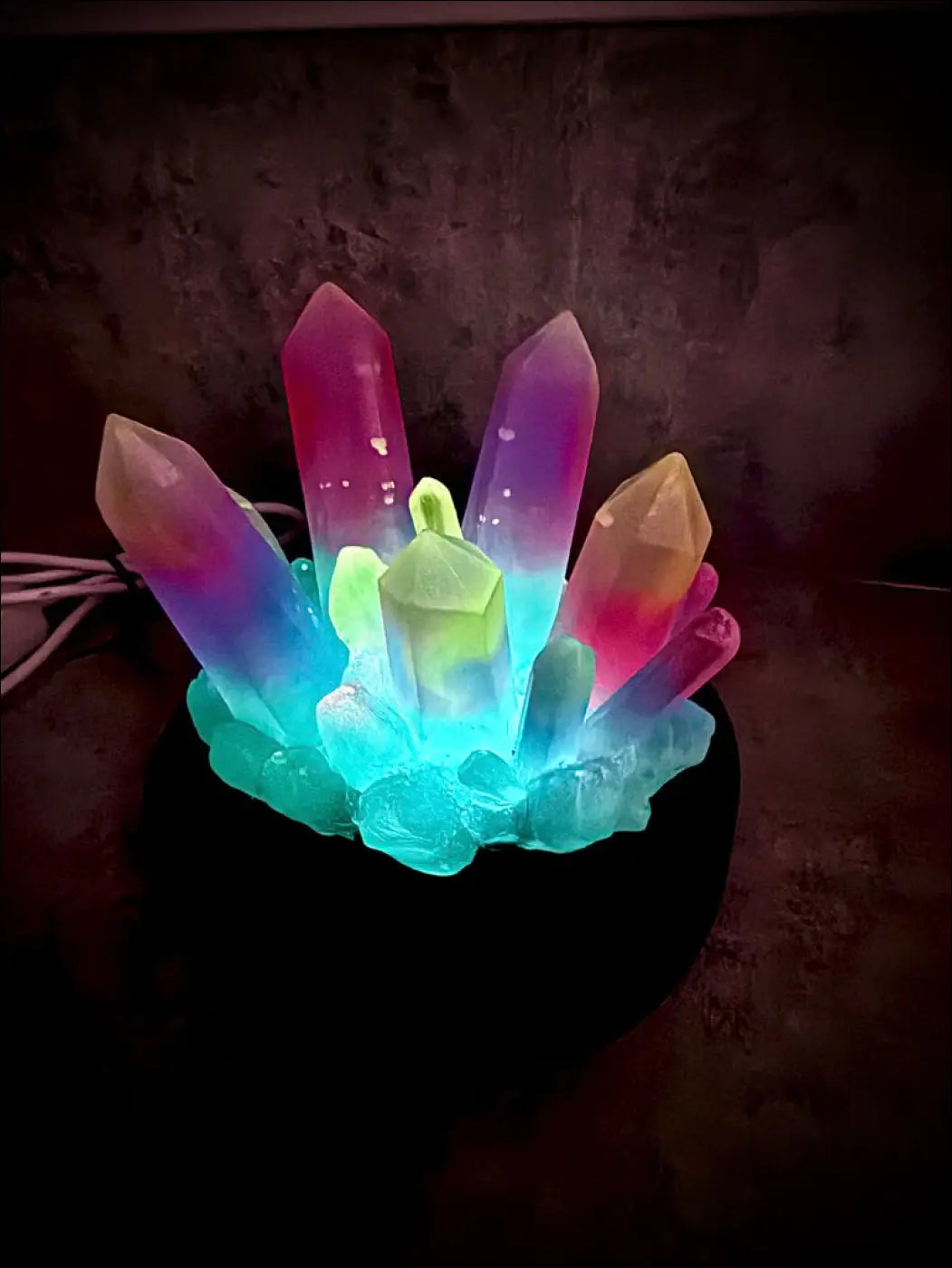 Large resin crystal cluster glow in the dark lamp with glowing pink purple green and blue resin crystals on wooden base