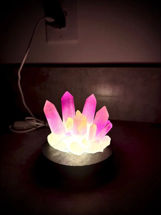 Large resin crystal cluster glow in the dark lamp with glowing pink and yellow resin crystal on frosted wooden base