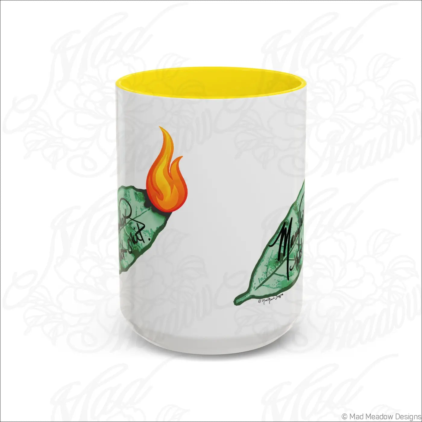White ceramic manifest that shit mug with glossy finish yellow colored interior and burning bay leaf illustration