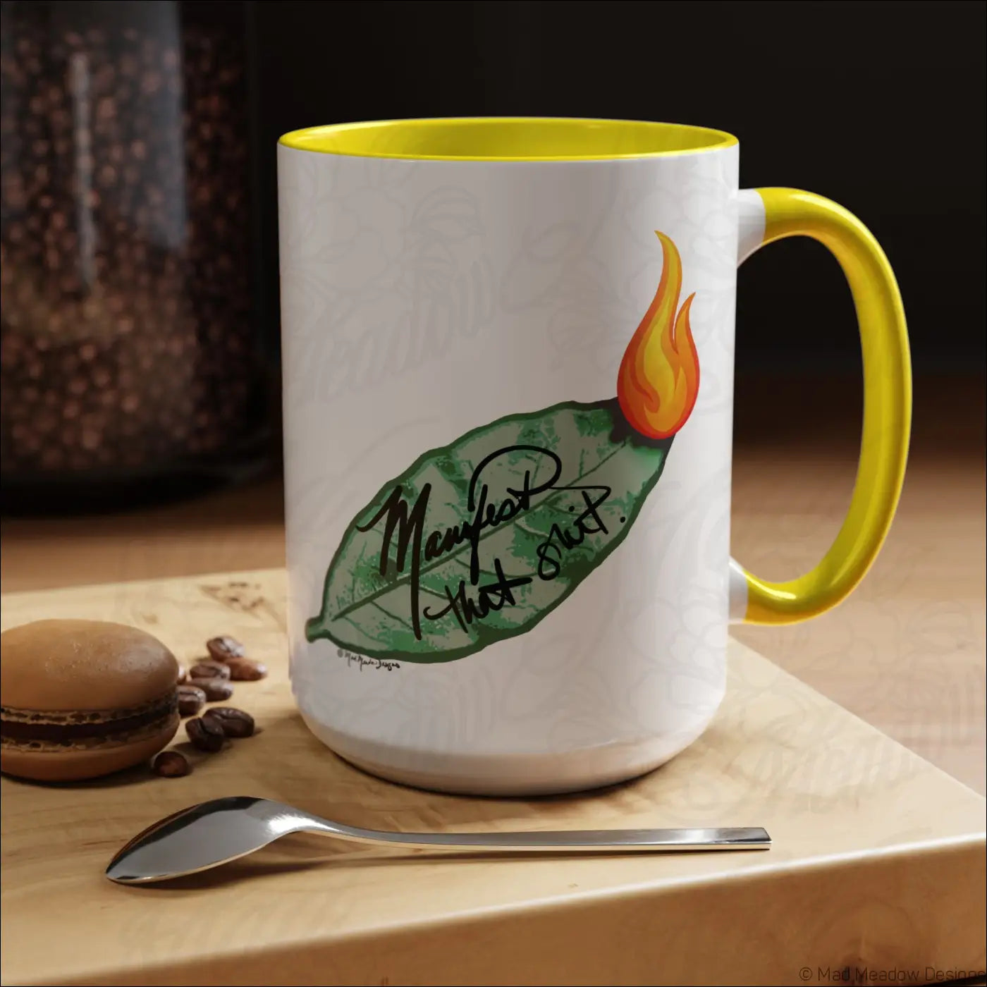 White ceramic mug with glossy finish and vibrant yellow colored interior featuring a bay leaf design and mend that part phrase