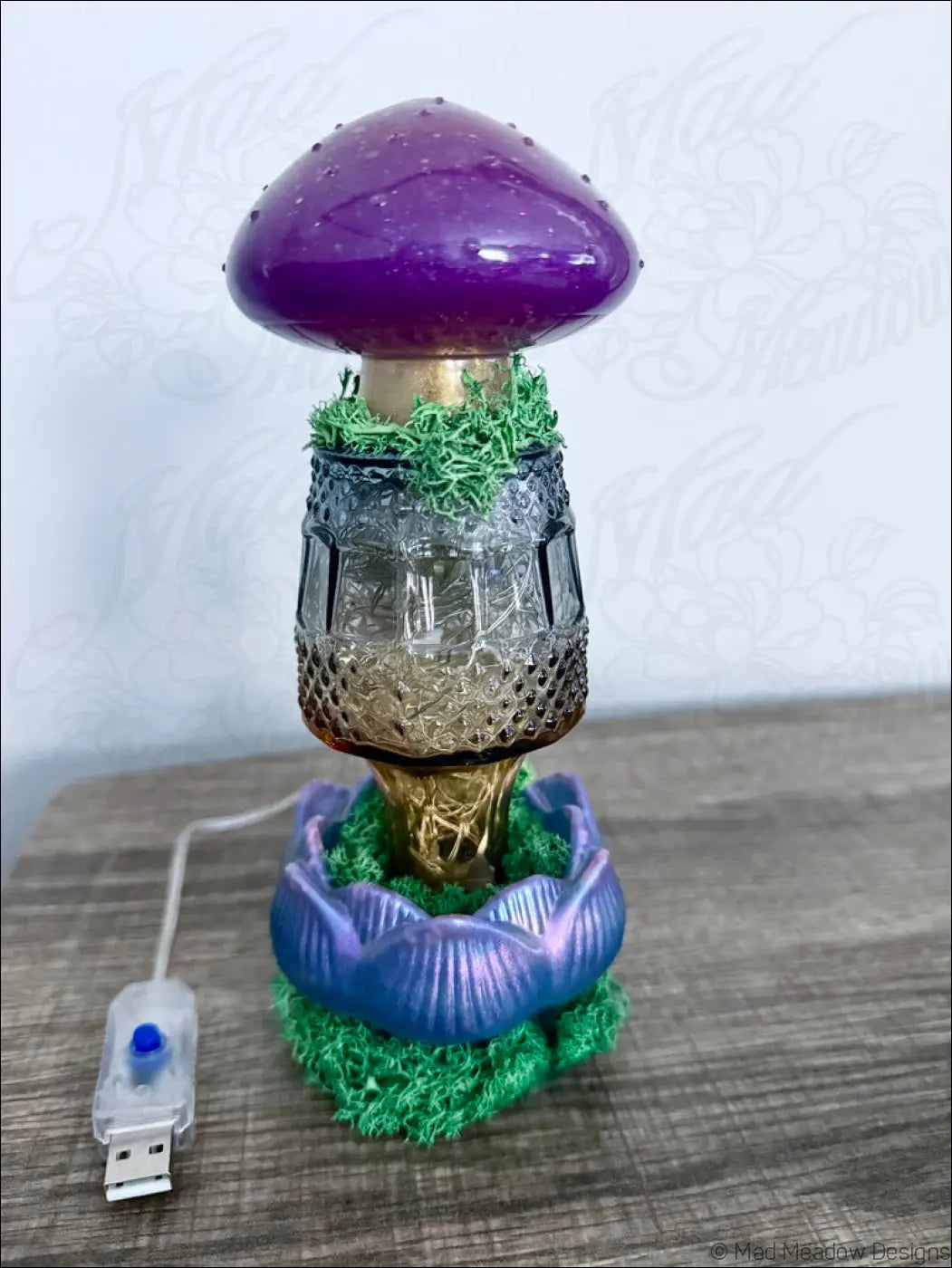 Purple mushroom-shaped led lamp with clear glass bud vase body gold accents and green moss base usb light
