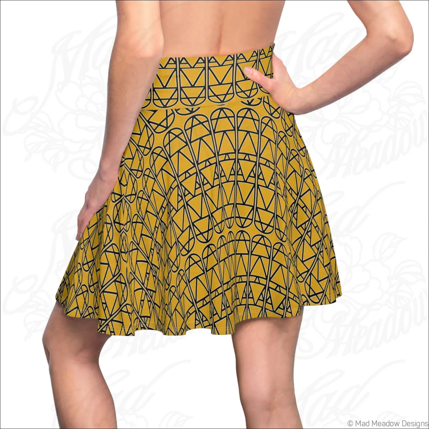 Mustard elemental column pattern women’s skater skirt with black geometric print and care instructions to hand wash