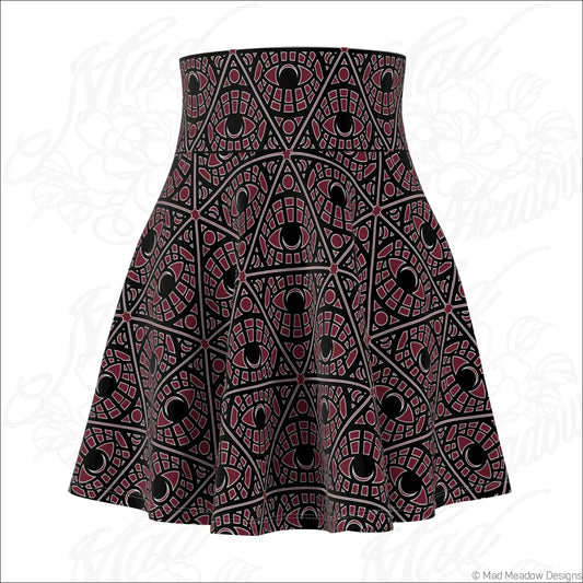 Mystic eye tribal pattern skater skirt in bordeaux with bold geometric eyes print on stretchy fabric and printed care label