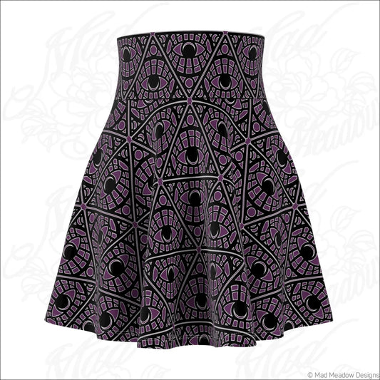 Flared eggplant skater skirt with bold mystic eye tribal pattern in stretch fabric and printed care label